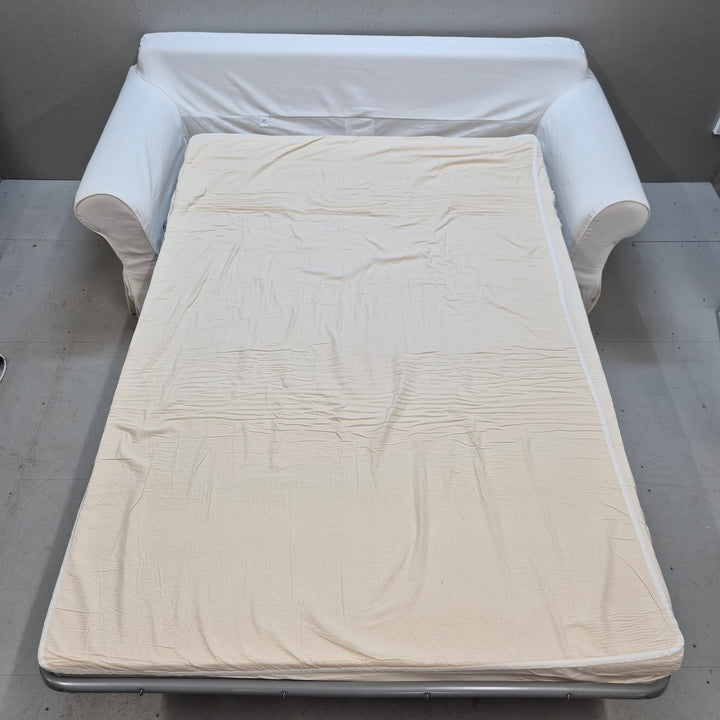 Elegant vit bäddsoffa i tyg i gott skick