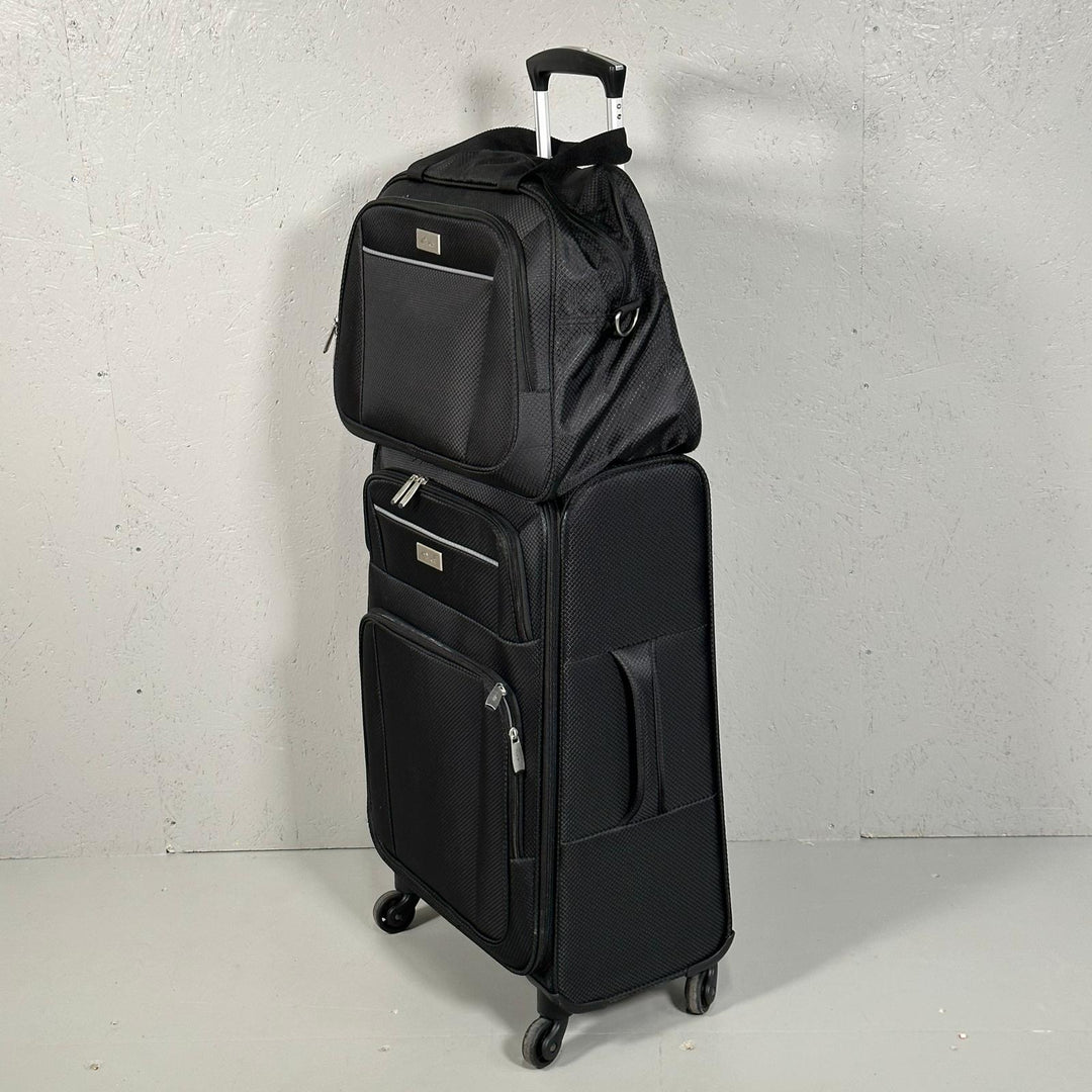 Resväska med matchande handväska