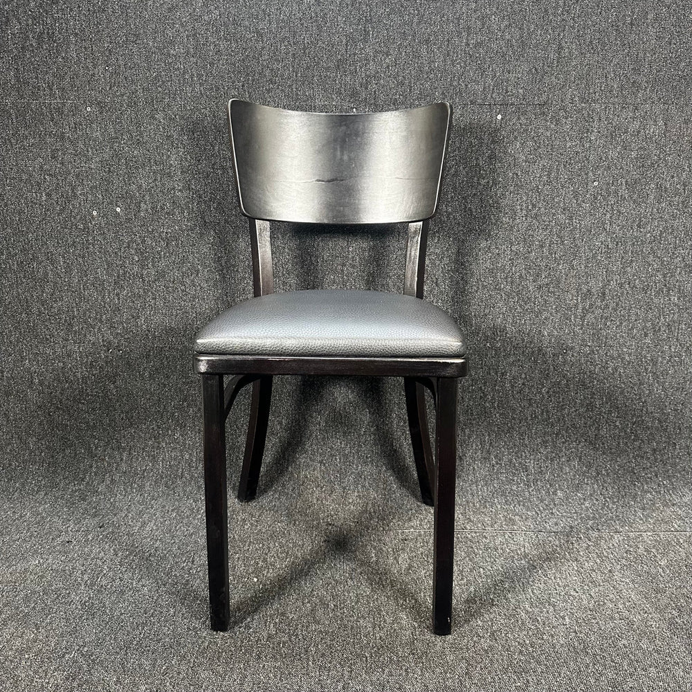 Svart modern matstol med lädersits - Homy Secondhand Online