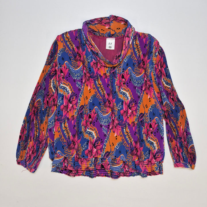 Färgglad Retroblus från Eurofashion 80-talet