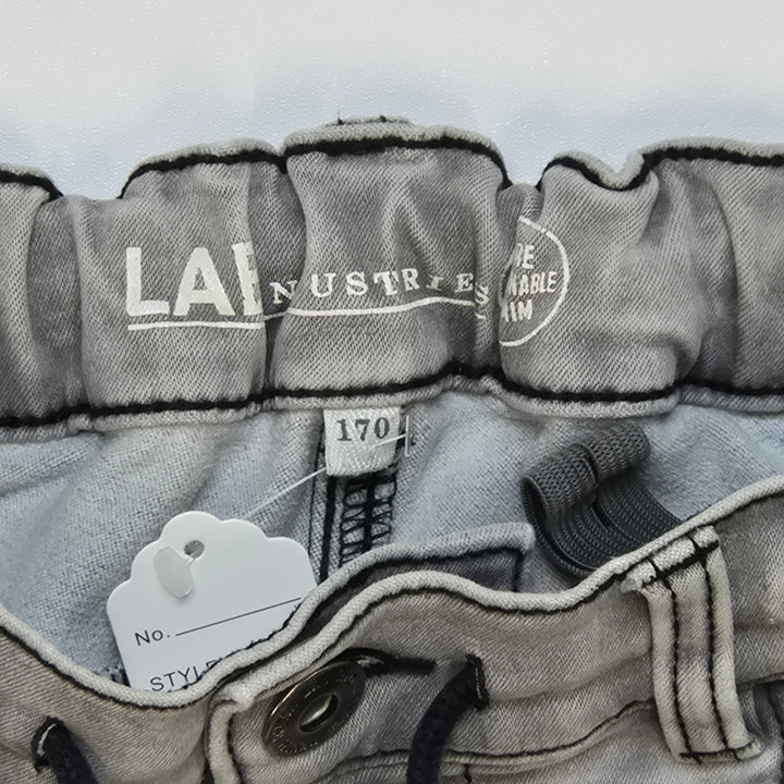 Grå slitna jeans med hög midja
