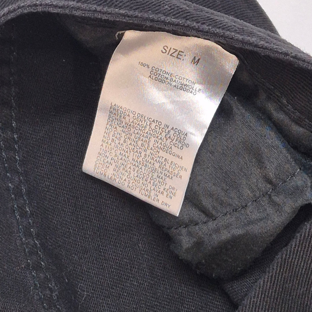 Svarta slitna jeans i bomull