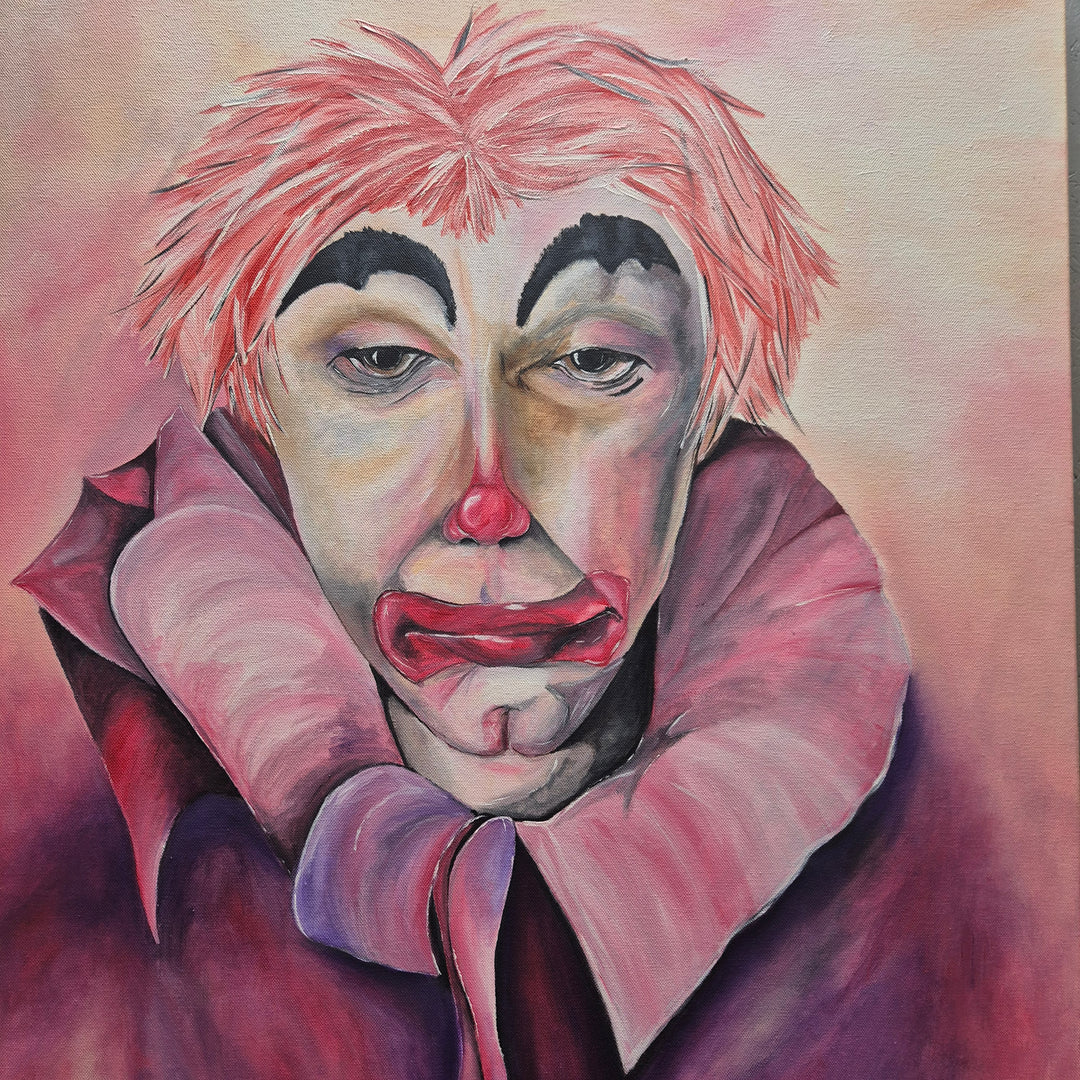 Färgstark tavla med känsloladdad clownmotiv