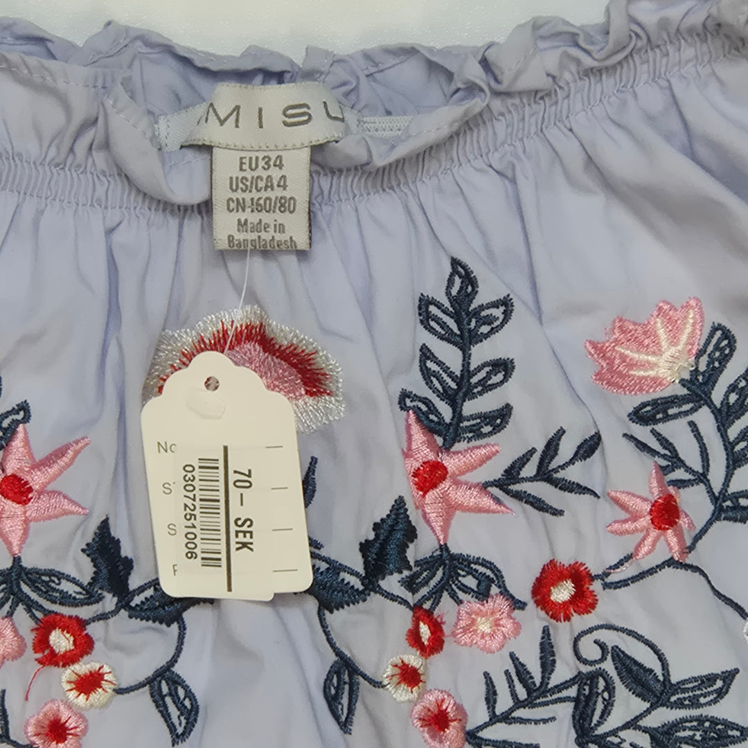 Blomstermönstrad klänning MISU ljusblå