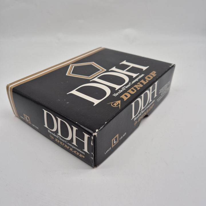Oöppnad retro Dunlop DDH golfbollslåda