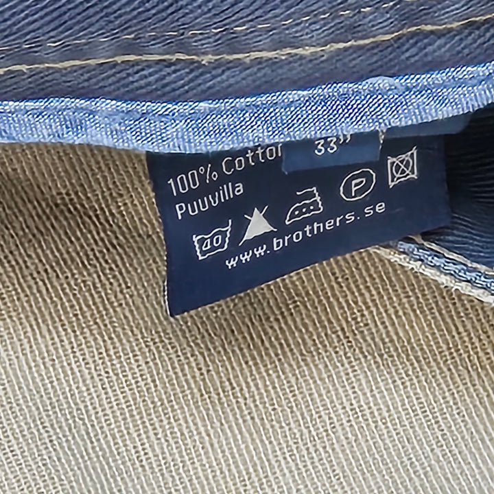 Khakifärgade chinos från Brothers i bomull