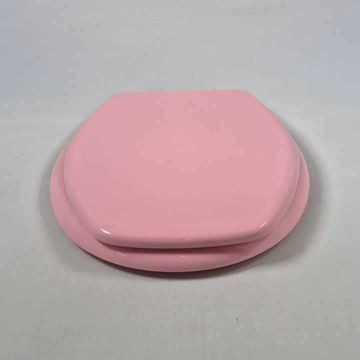 Retro rosa toalettsits i pastellfärg