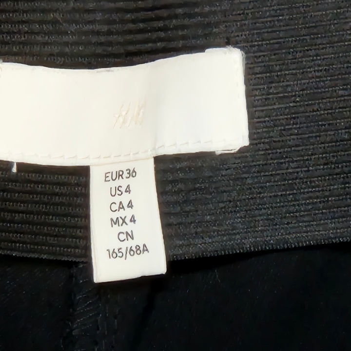 Retro svarta utsvängda byxor från Zara