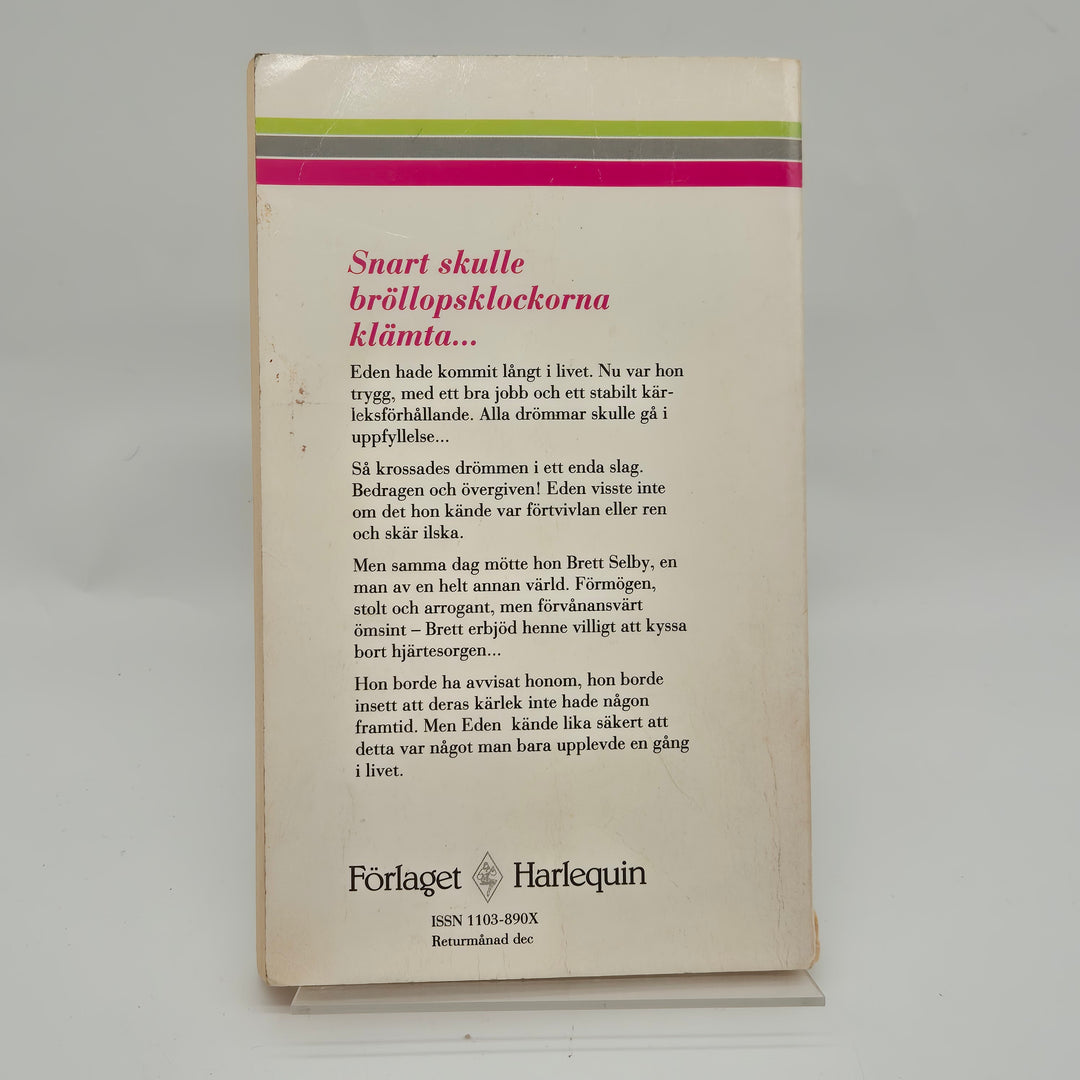 Retro Harlequinroman av Emma Darcy