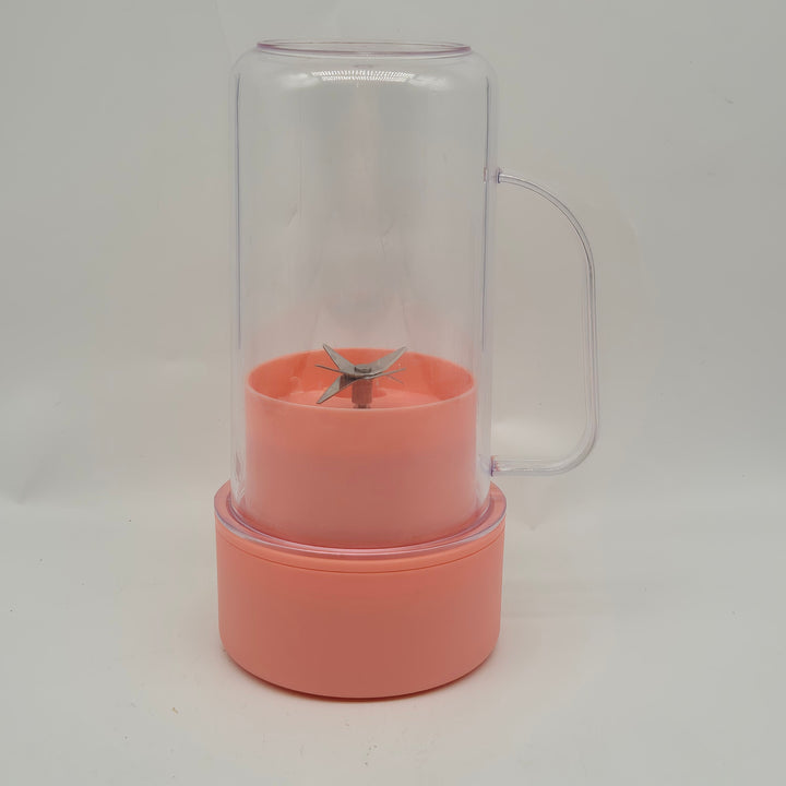 Färgglad korallfärgad smoothie-blender i gott skick