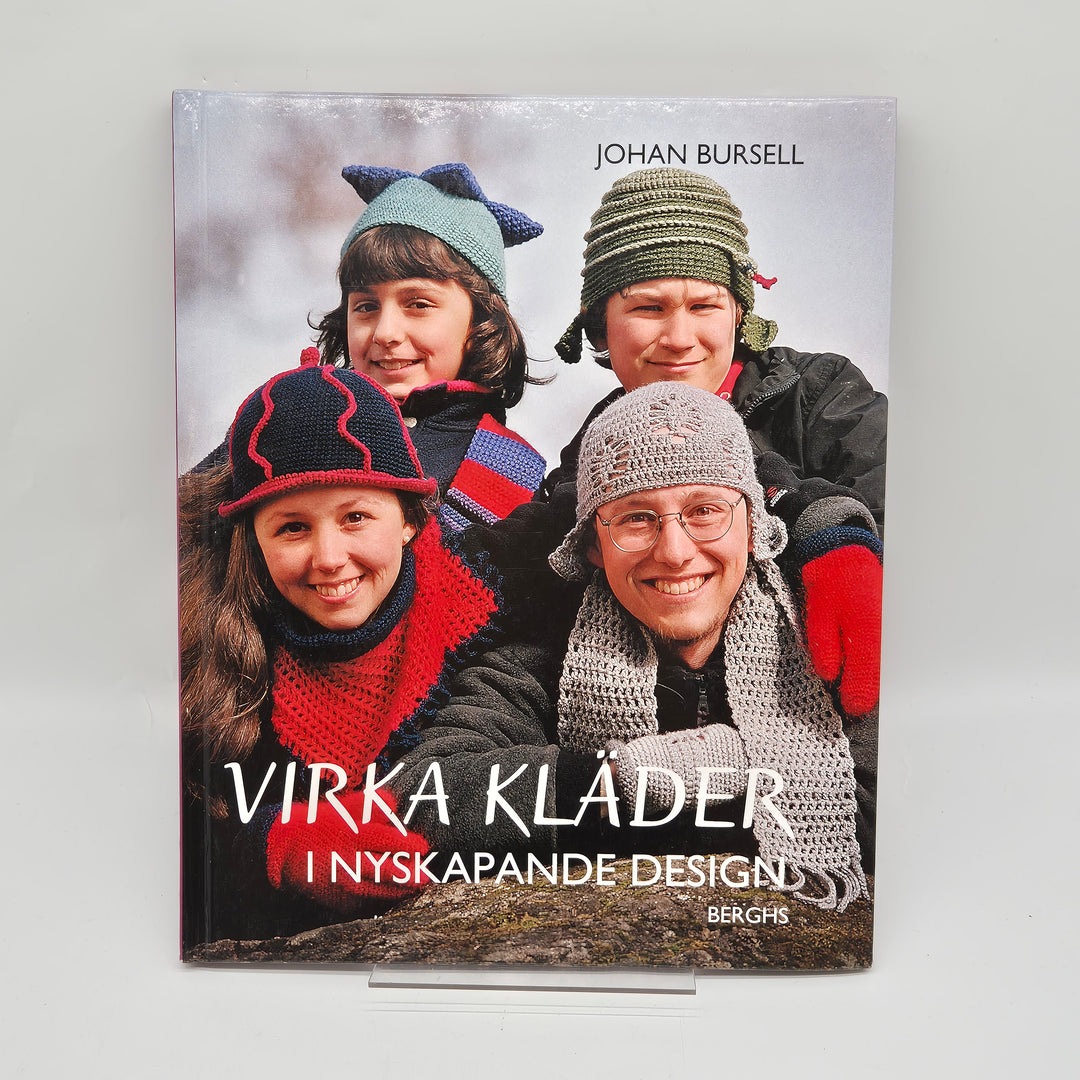 Virkade kläder i nyskapande design bok