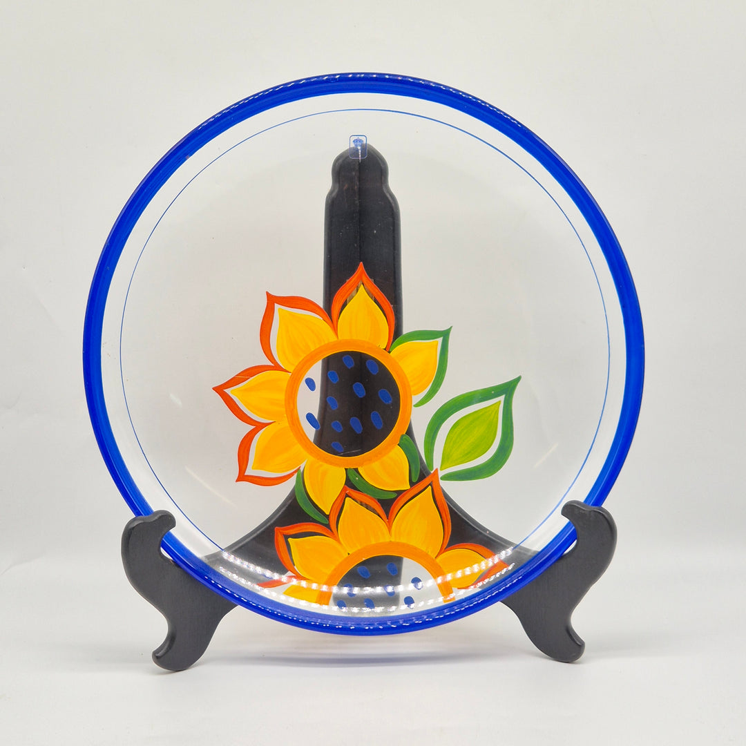 Retro dekorativ tallrik med solrosdesign från Christineholm