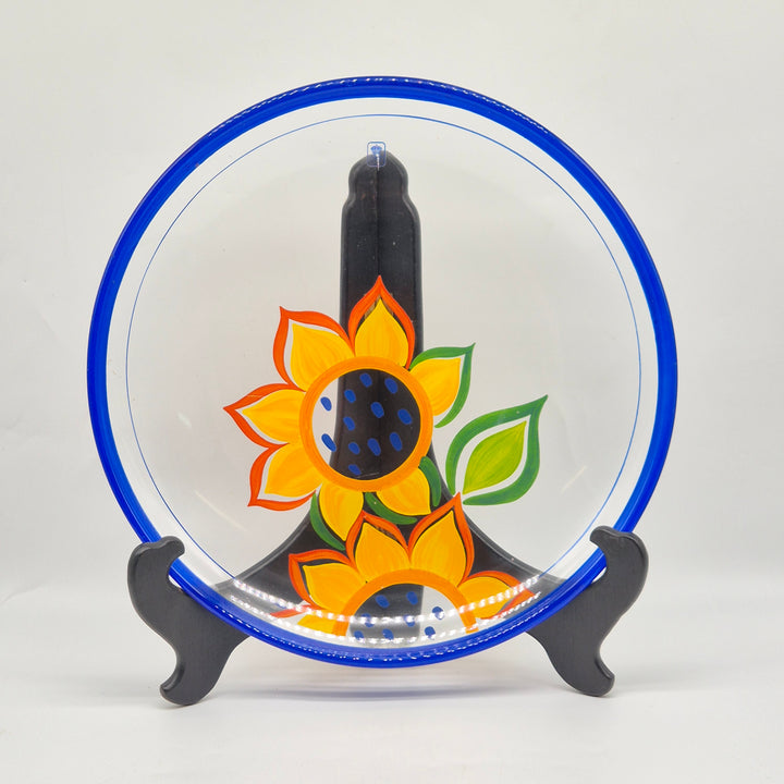 Retro dekorativ tallrik med solrosdesign från Christineholm