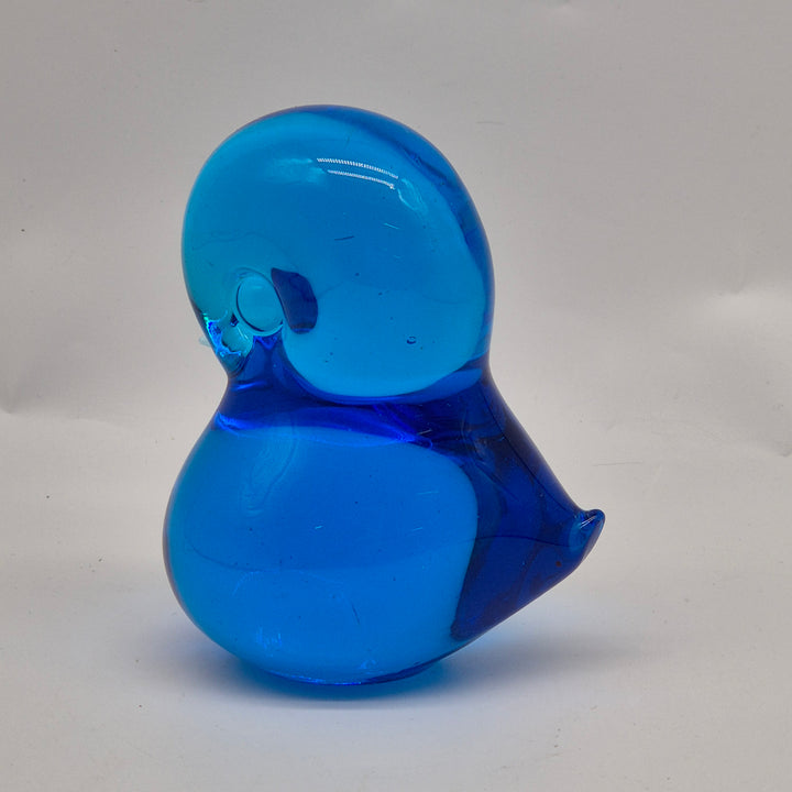 Retro blå glasfågel i elegant design