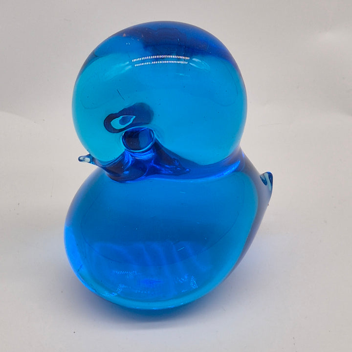 Retro blå glasfågel i elegant design