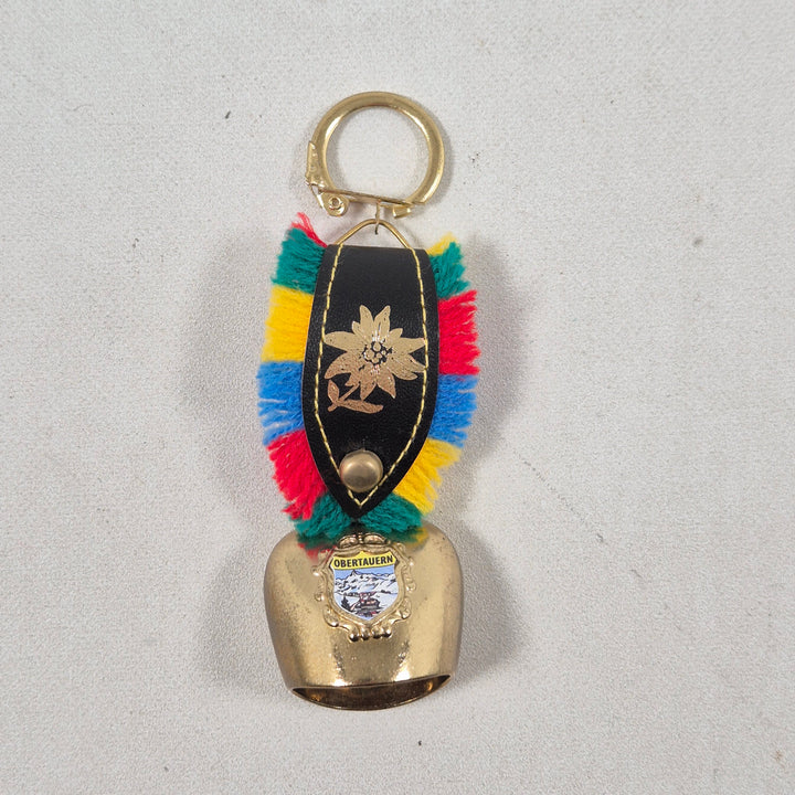 Färgglad alpin retro nyckelring med klocka