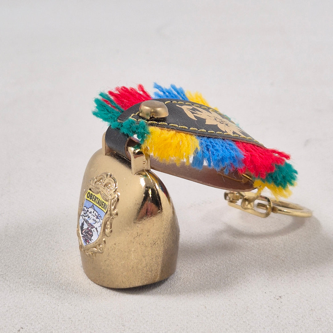 Färgglad alpin retro nyckelring med klocka