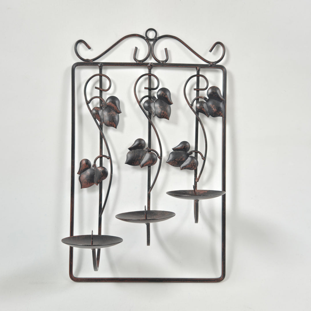 Vintage ljushållare i metall med fågelfigurer