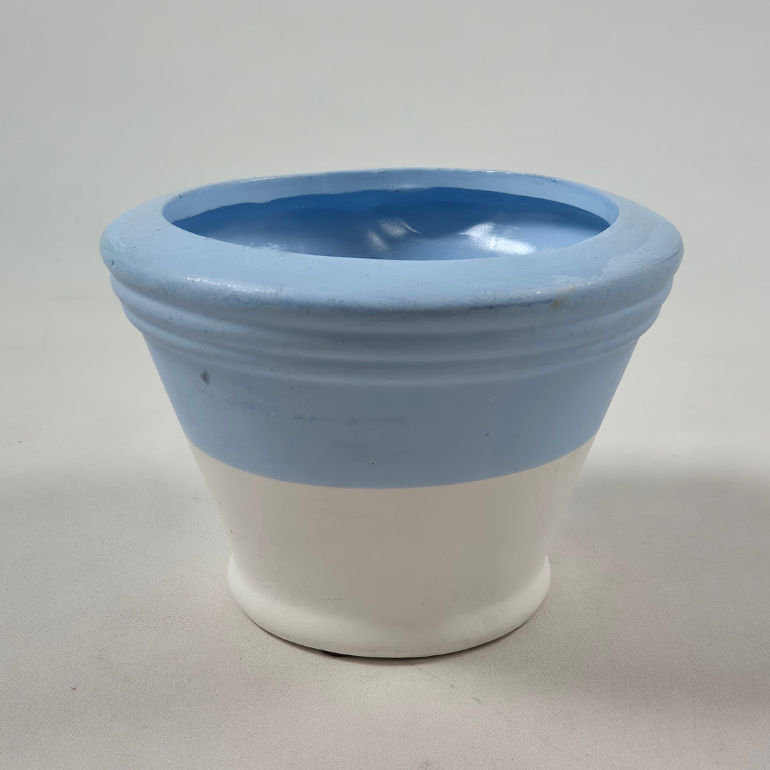 Retro keramikblomkruka med vintermotiv