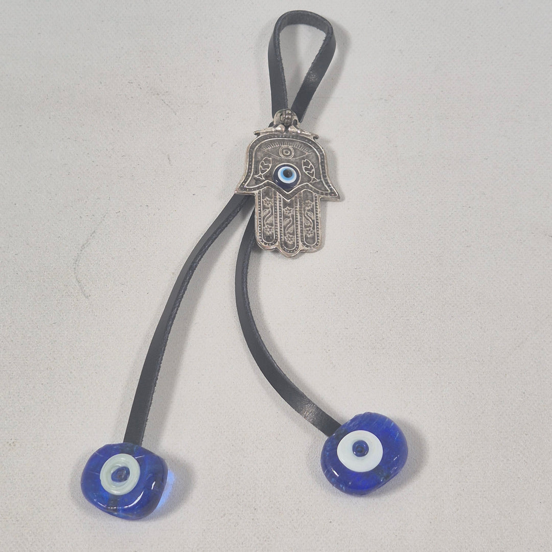 Retro amulett med blått öga i metall