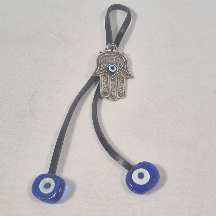 Retro amulett med blått öga i metall