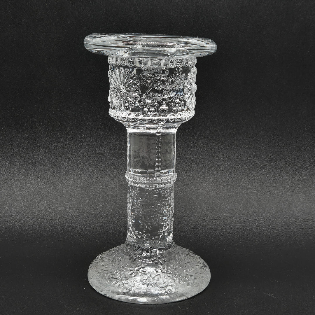 Elegant glasljusstake med retro charm