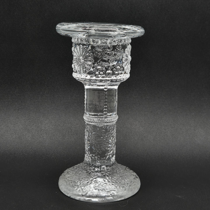 Elegant glasljusstake med retro charm