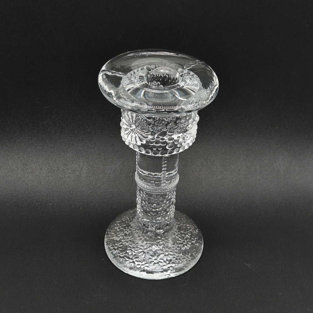 Elegant glasljusstake med retro charm