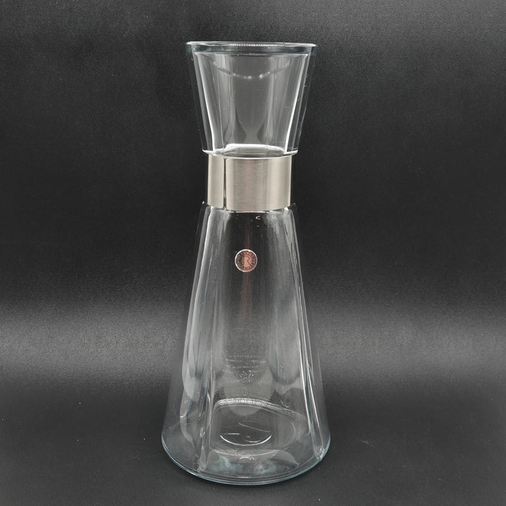 Elegant begagnat vattenglas i glas och metall från Rosendahl
