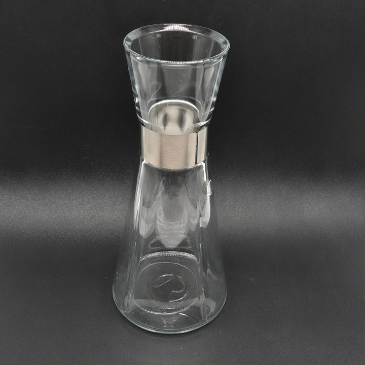 Elegant begagnat vattenglas i glas och metall från Rosendahl