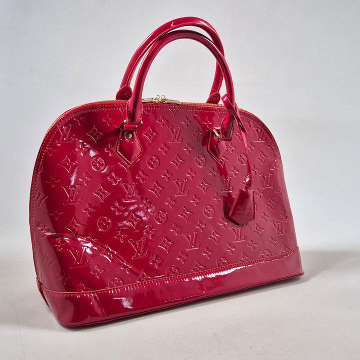 Lyxig röd Louis Vuitton handväska