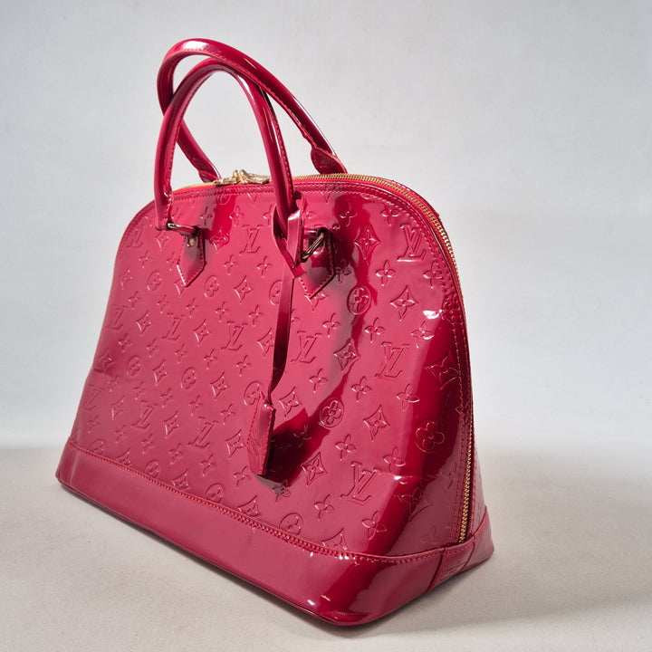 Lyxig röd Louis Vuitton handväska