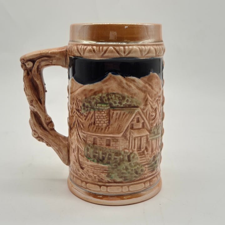 Retro keramikölsejdel med handmålat folkloristiskt motiv