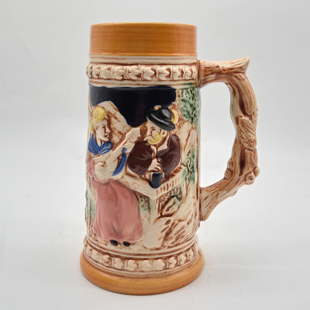 Retro keramikölsejdel med handmålat folklivsmotiv