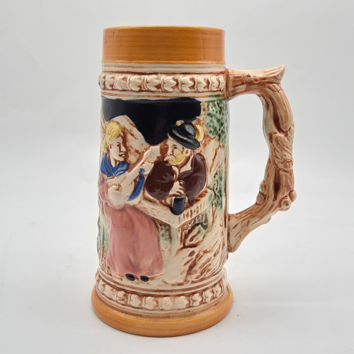 Retro keramikölsejdel med handmålat folklivsmotiv