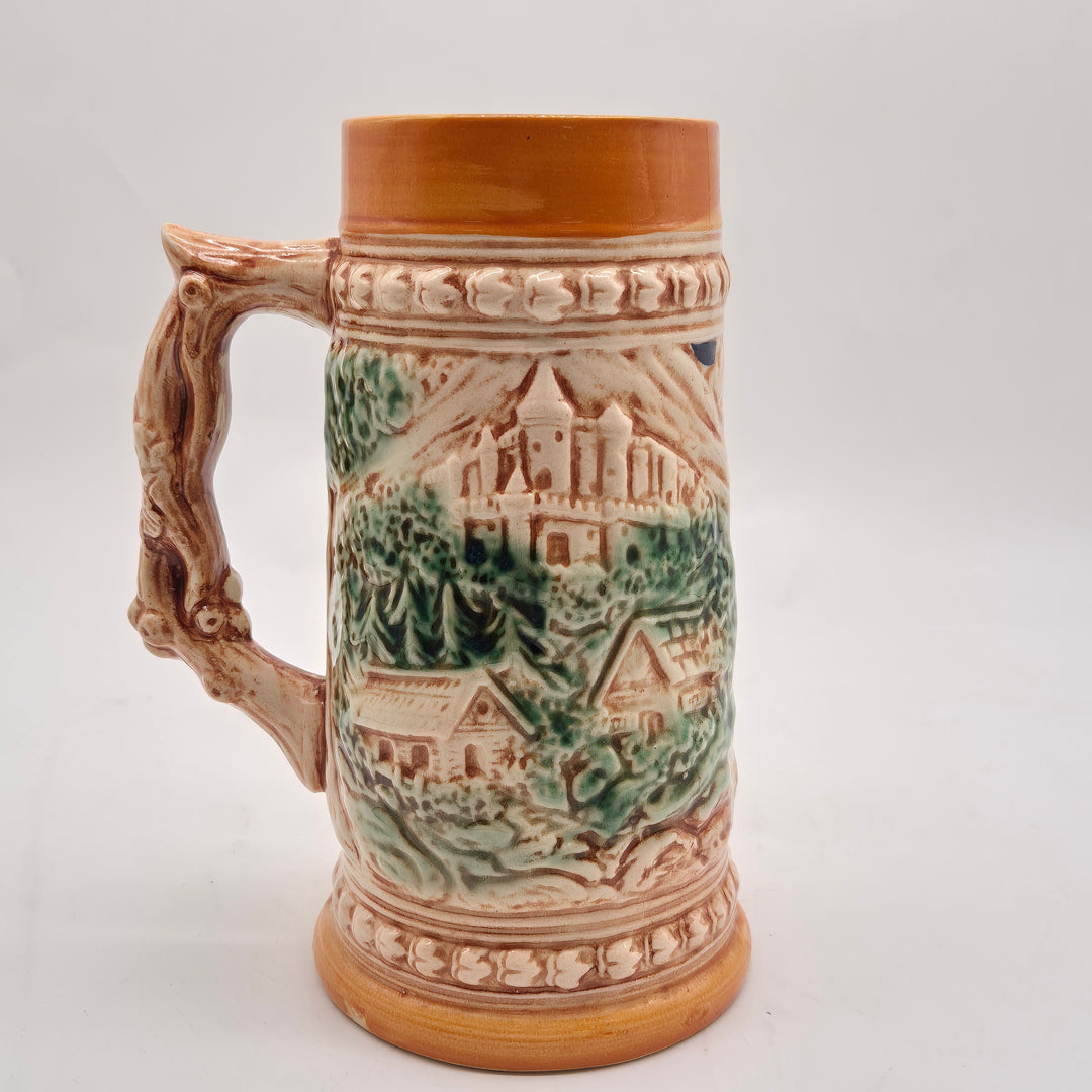 Retro keramikölsejdel med handmålat folklivsmotiv