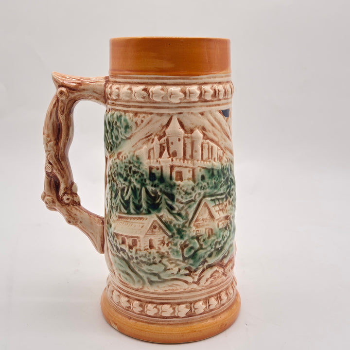 Retro keramikölsejdel med handmålat folklivsmotiv