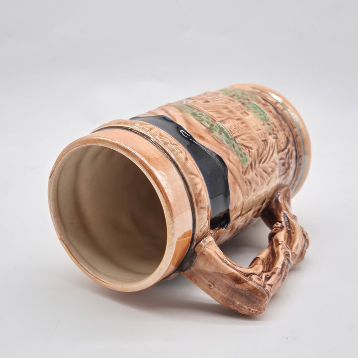 Retro keramikölsejdel med handmålat folkloristiskt motiv