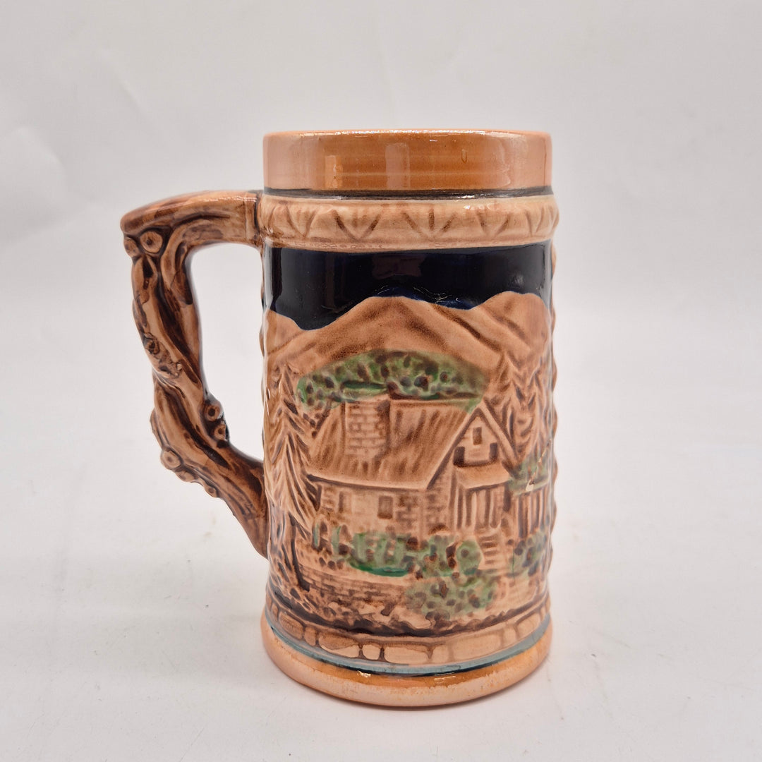 Retro keramisk ölsejdel med tysk landskapsscen