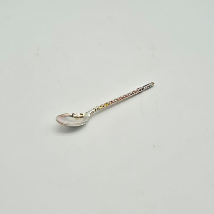 Elegant tesked i rostfritt stål med gulddetalj (12st)