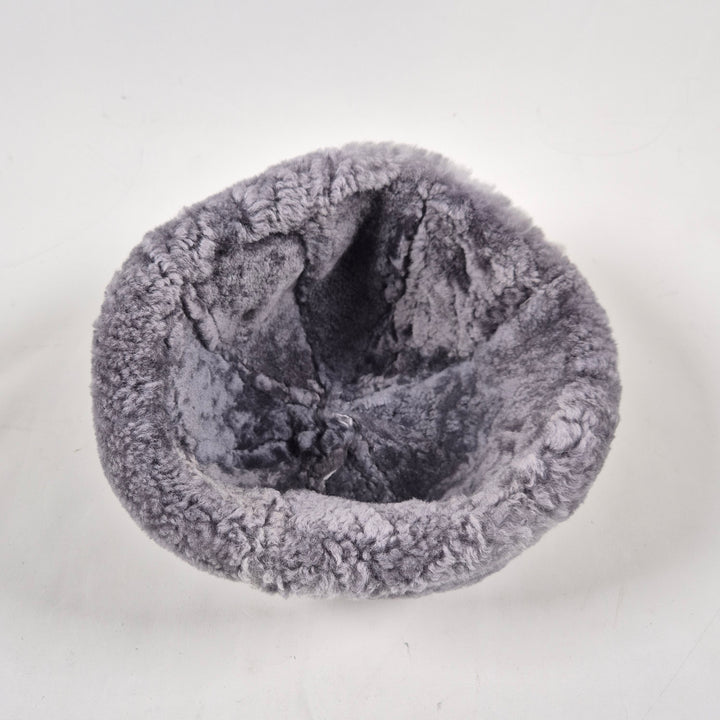 Varm vintermössa i konstläder och mjuk fleece – Herr