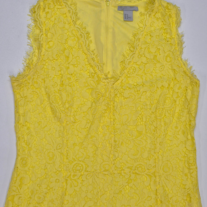 Gul spetsklänning H&M EUR M