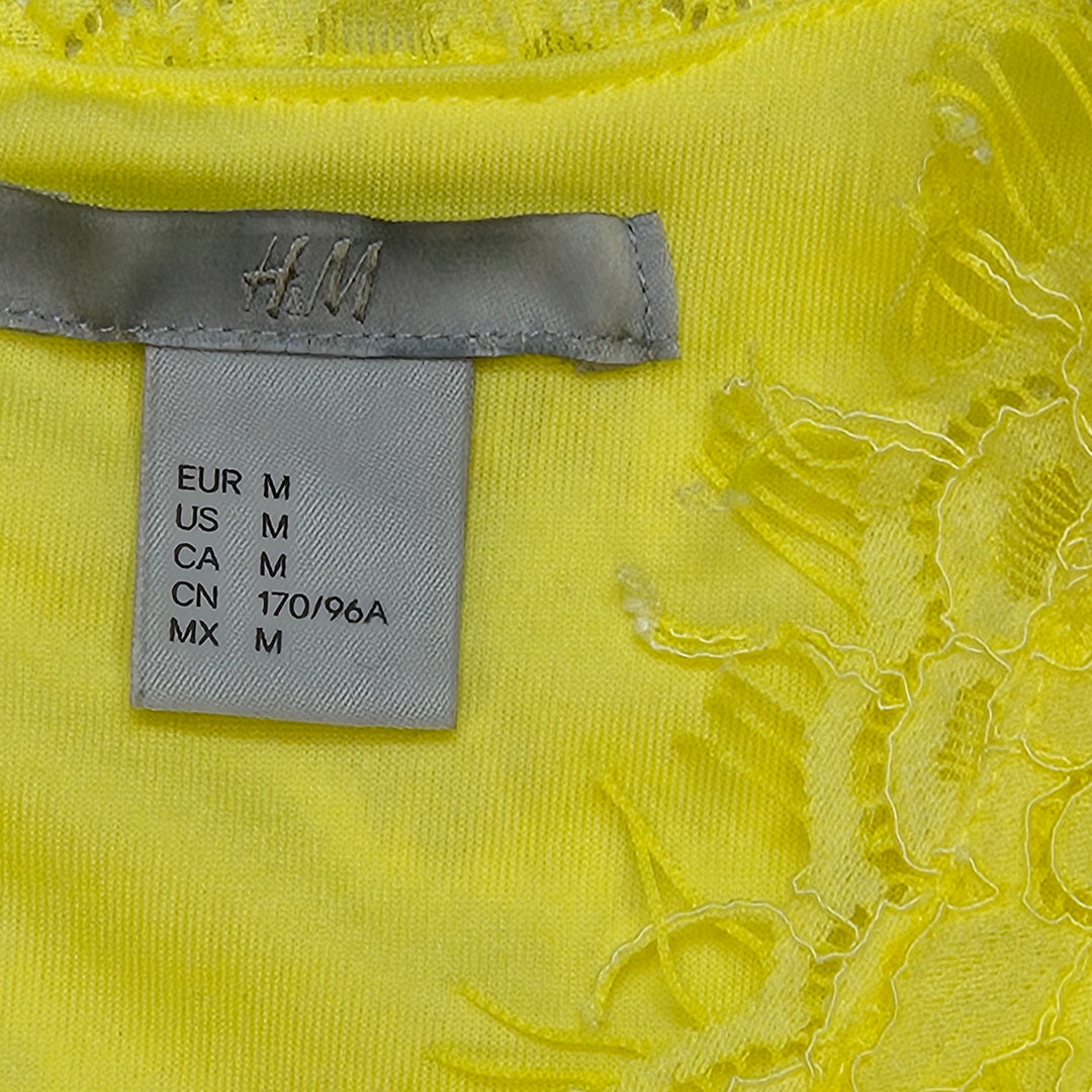 Gul spetsklänning H&M EUR M