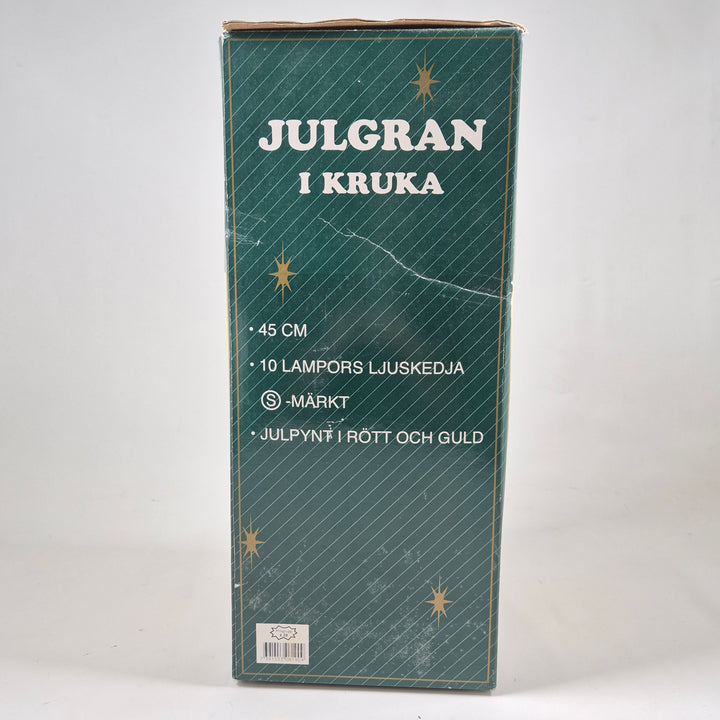 Charmig julgran i kruka med belysning