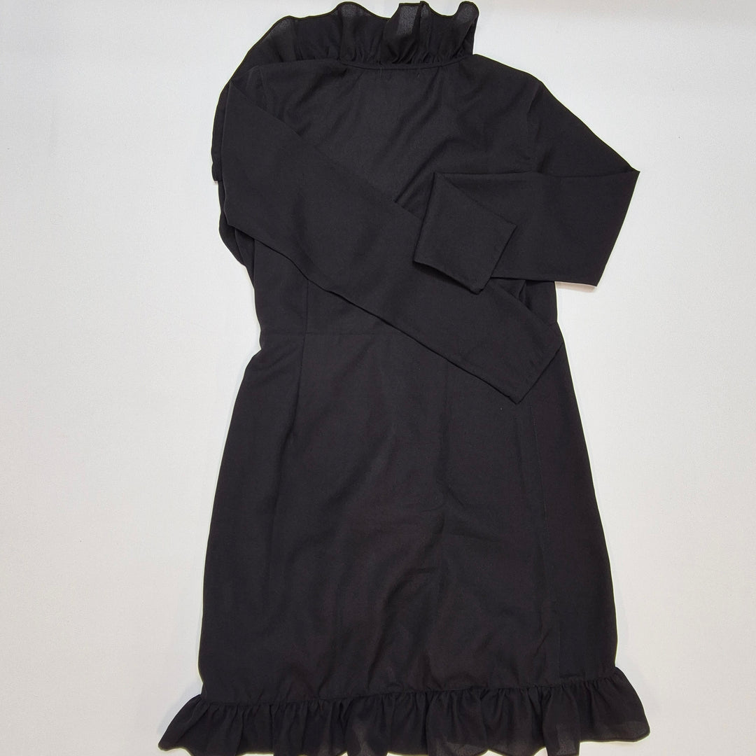 Elegant svart klänning med rynk från NLY Trend