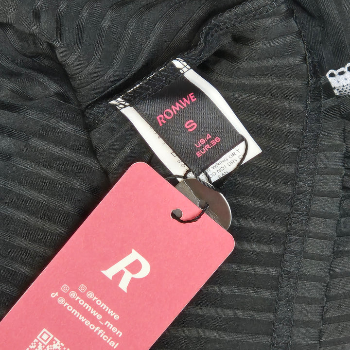 Elegant svart blus med spetsdetaljer från Romwe