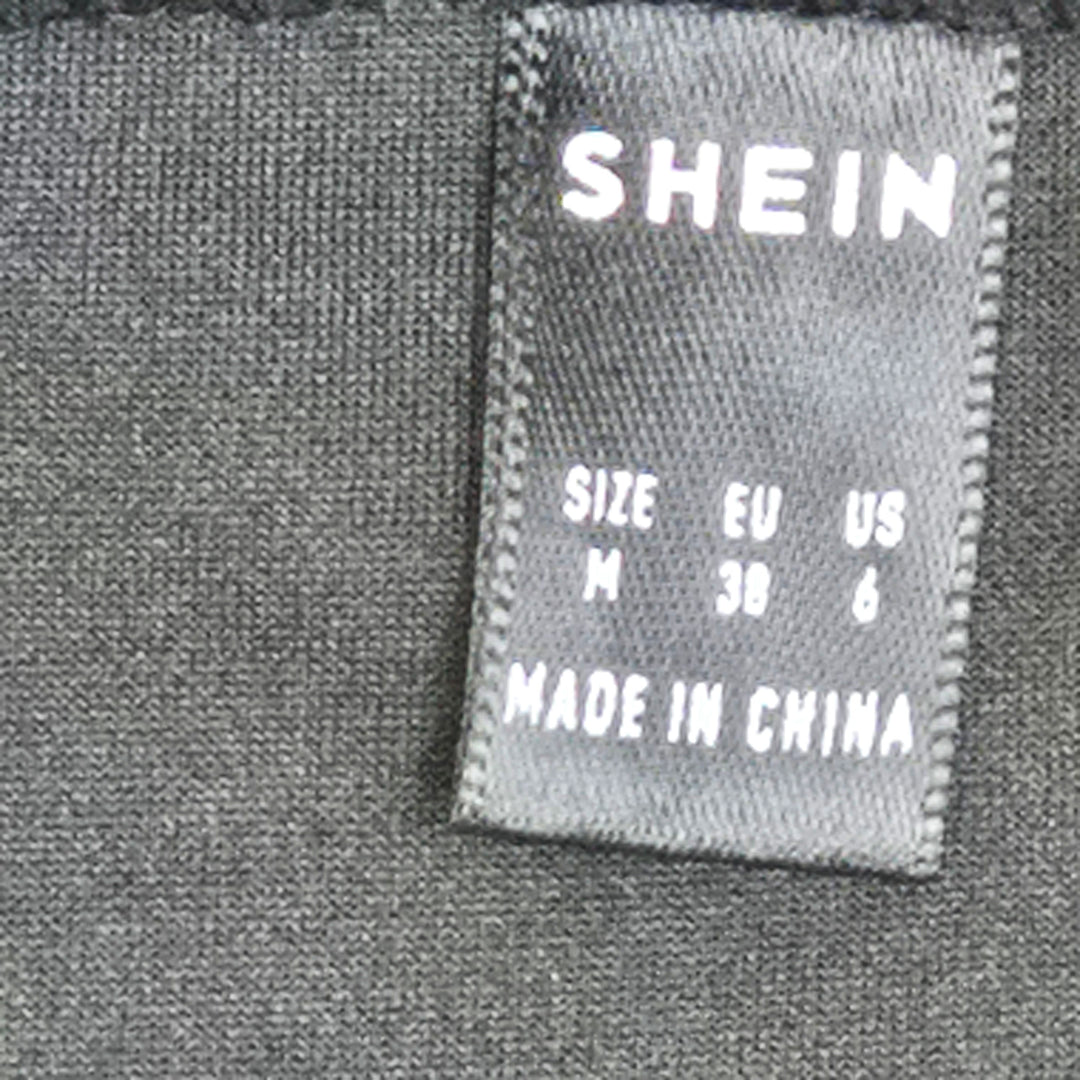 Elegant grå Shein kjol med volanger