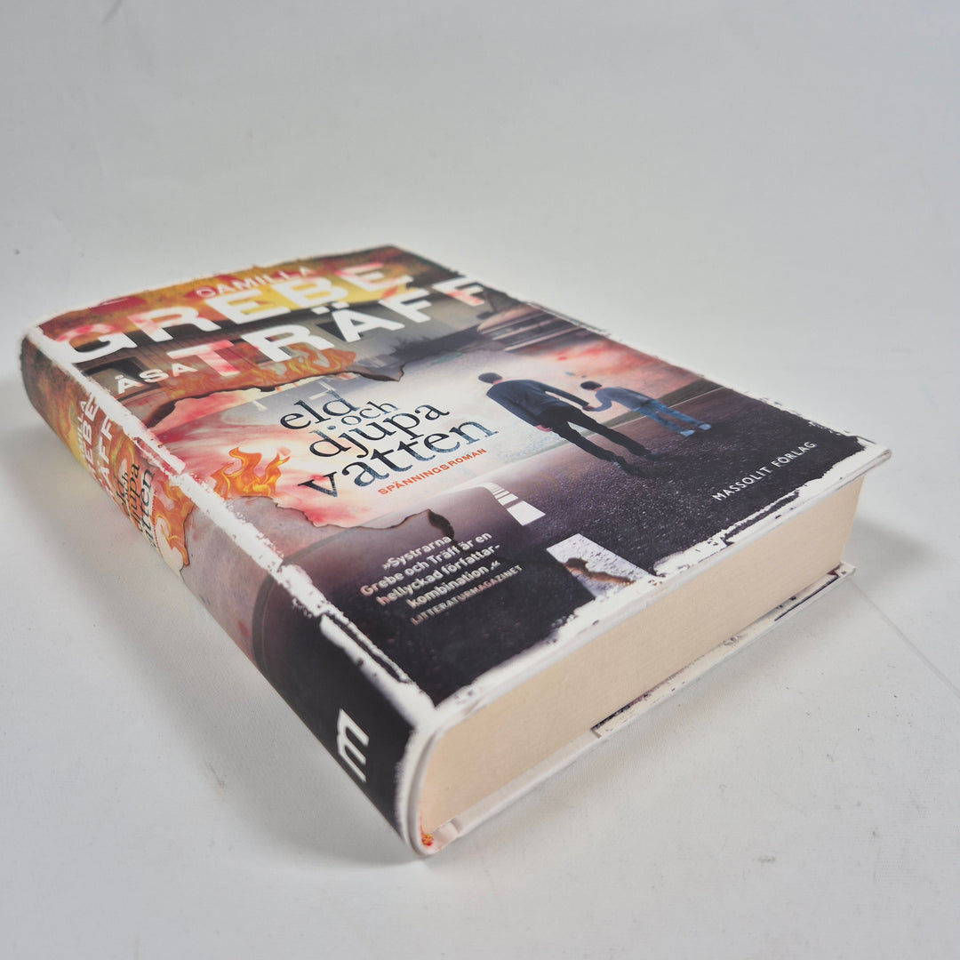 Eld och djupa vatten spänningsroman inbunden bok