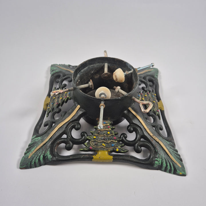 Retro julgransfot i målat gjutjärn