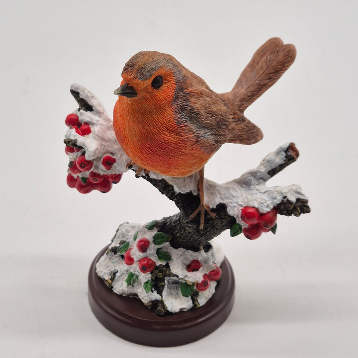 Rödhake på snötäckt gren Atlas Editions figur